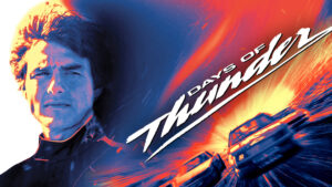 Promotional poster for the movie 'Days of Thunder' featuring a left-side portrait of a man in a racing uniform against a blue-orange fiery backdrop and diagonal title text.