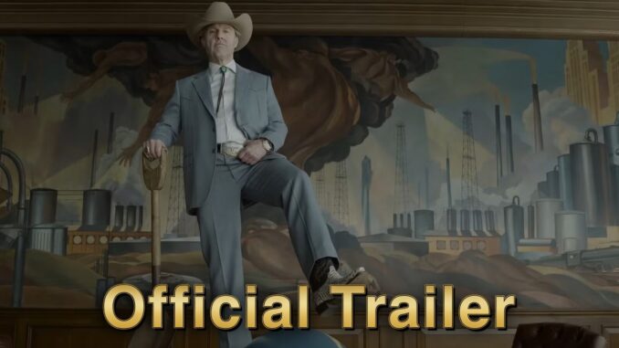 Man in a light gray suit and cowboy hat stands with a cane in front of an industrial factory mural, overlaid with 'Official Trailer' text.