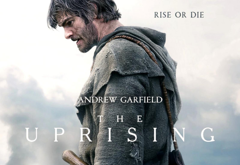 Movie poster of a rugged man in a tattered cloak, looking down; text reads 'Rise or Die' and 'The Uprising'.