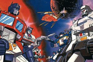 Autobots clash in a space battle, facing off with guns drawn and a large space station behind them.